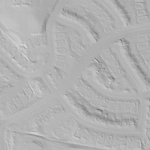 Greyscale hillshade of a residential area, showing streets and building pads.